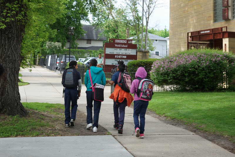 Stonebridge World School students walking to school building